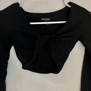 super cute long sleeve with a twist in the middle. very flattering